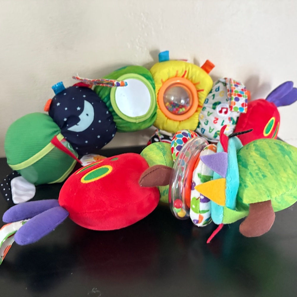 Eric Carle set of 2 infant toys/teethers. Clip on style, fidget, noise- maker.